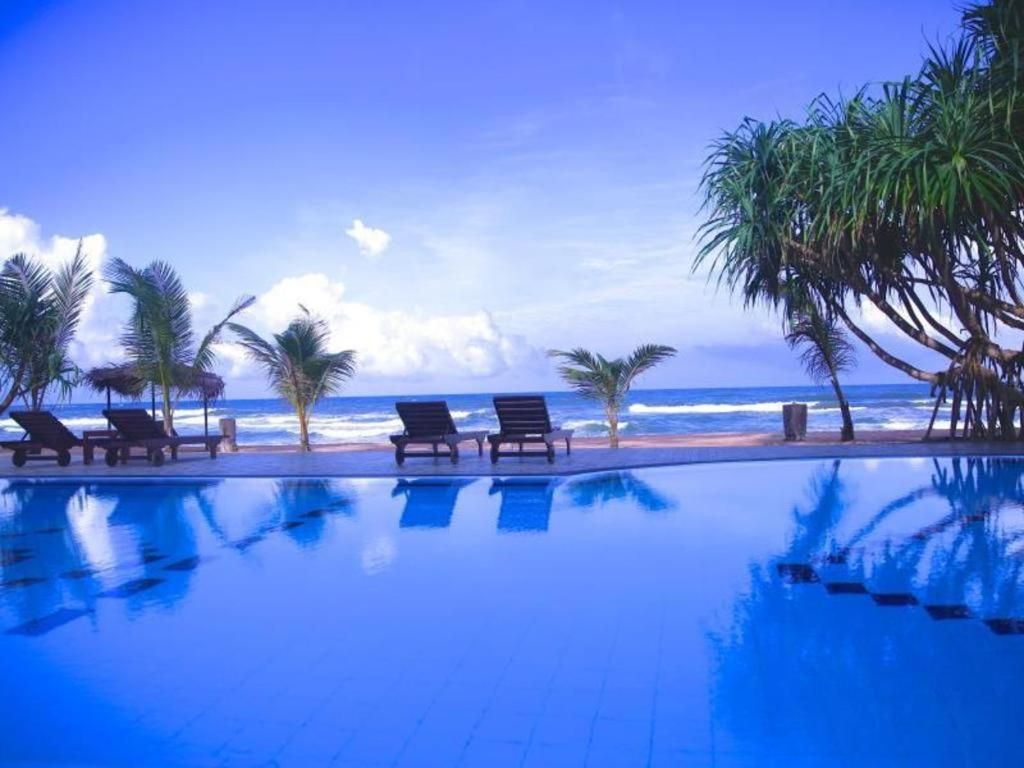 Whispering Palms Hotels фото 7