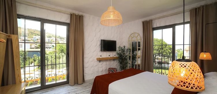 Фото отеля Huzurla Otel