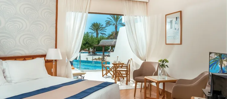 Фото отеля Constantinou Bros Athena Beach Hotel