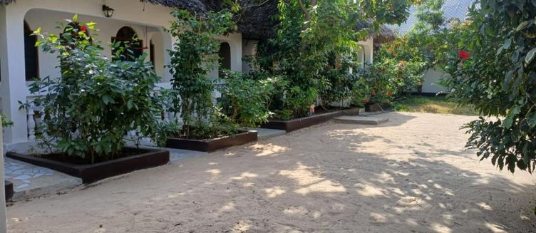 Фото отеля KIVi Cottages Nungwi