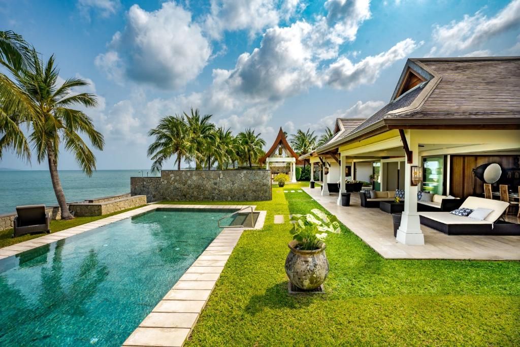 Miskawaan Beachfront Villas фото 35