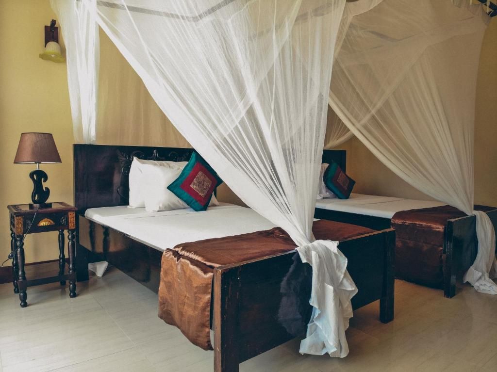 Amaan Beach Bungalows фото 46