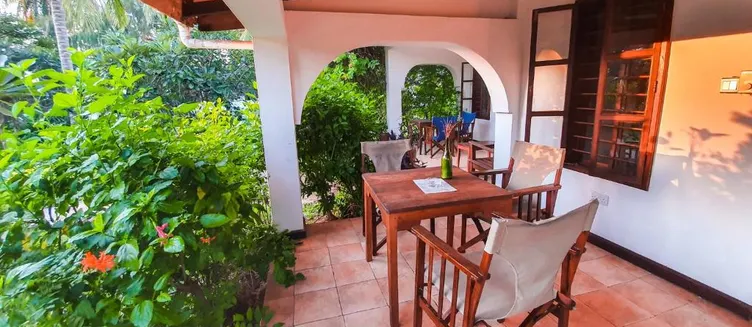 Фото отеля Flame Tree Cottages