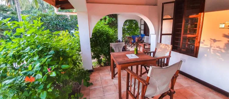 Фото отеля Flame Tree Cottages