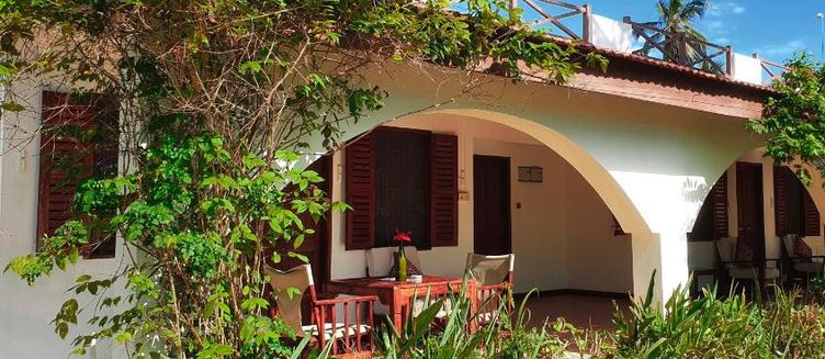 Фото отеля Flame Tree Cottages