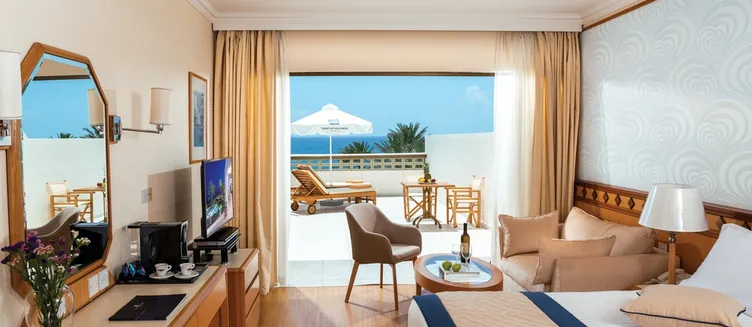 Фото отеля Constantinou Bros Athena Beach Hotel