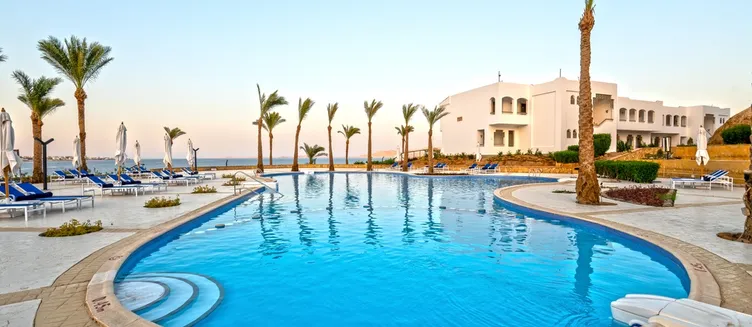 Фото отеля Invidia Coral Beach Tiran