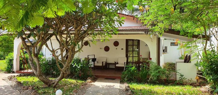 Фото отеля Flame Tree Cottages