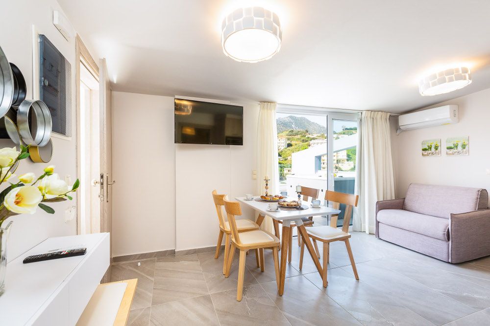 Luxury Suite with Sea View in Akrogiali Luxury Aparthotel фото 49
