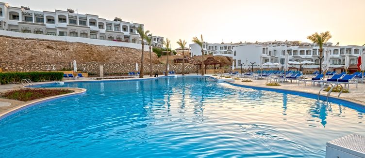 Фото отеля Invidia Coral Beach Tiran