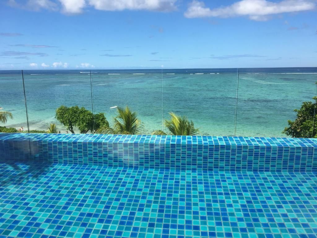 Cap Ouest Beachfront Luxury Penthouse фото 6