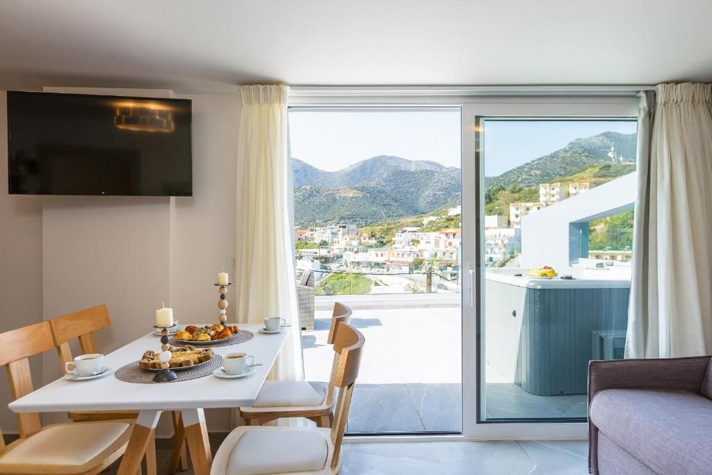 Luxury Suite with Sea View in Akrogiali Luxury Aparthotel фото 7