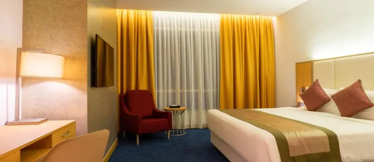 Фото отеля Tamu Hotel & Suites