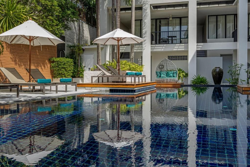Outrigger Surin Beach Resort фото 42