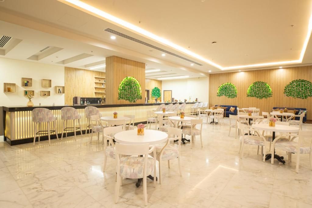 Tolip Hotel Olympic International City фото 11