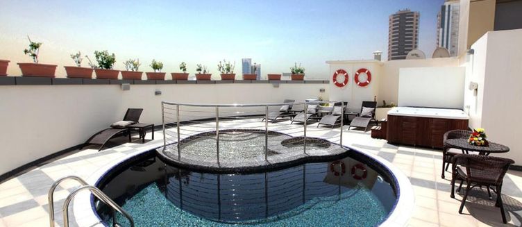 Фото отеля Xclusive Maples Hotel Apartments