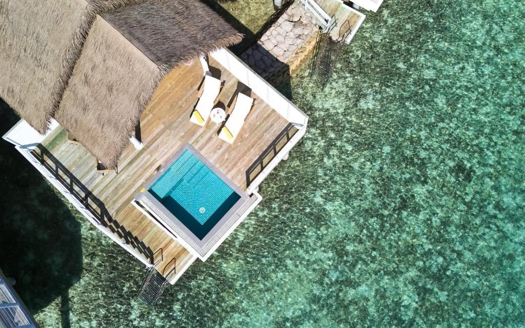 NH Maldives Kuda Rah Resort фото 85