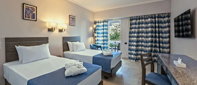 Фото отеля Invidia Coral Beach Tiran