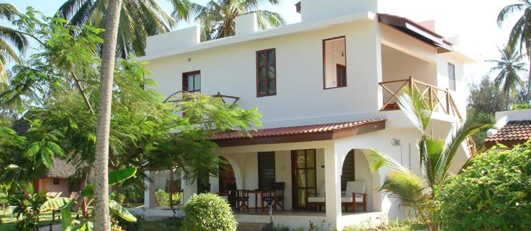 Фото отеля Flame Tree Cottages