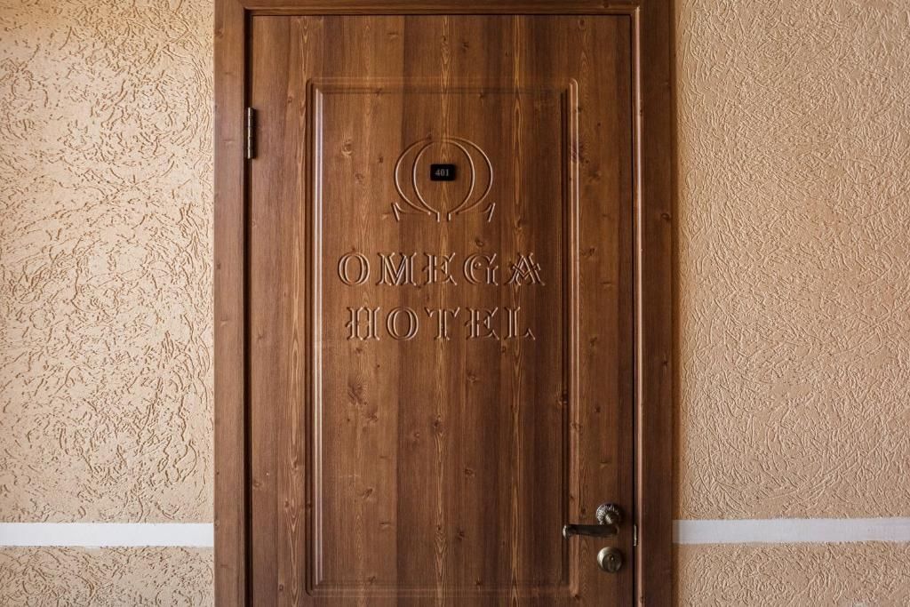 Омега фото 64