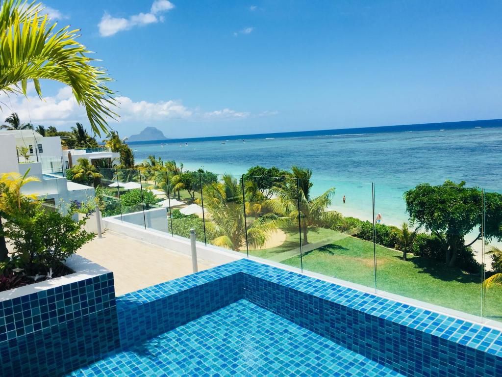 Cap Ouest Beachfront Luxury Penthouse фото 12