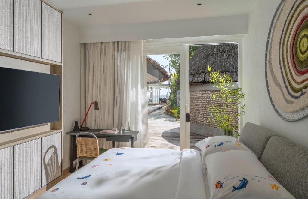Four Seasons Resort Maldives at Kuda Huraa фото 53