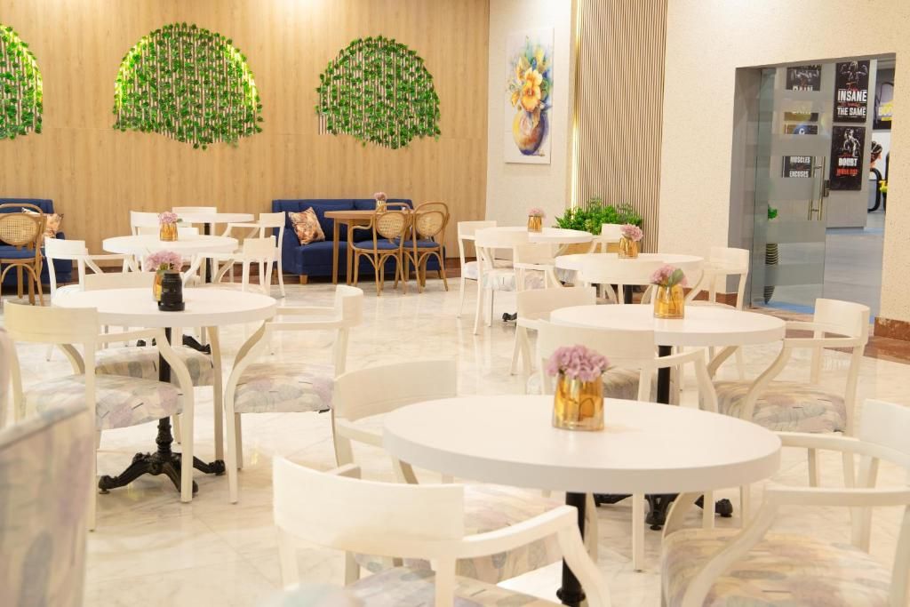 Tolip Hotel Olympic International City фото 12