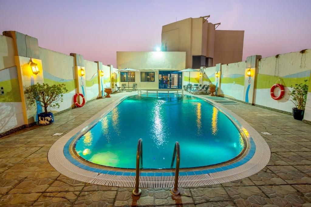 Al Jawhara Gardens фото 13