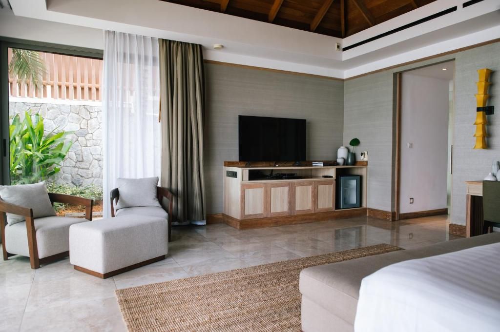 Miskawaan Beachfront Villas фото 25