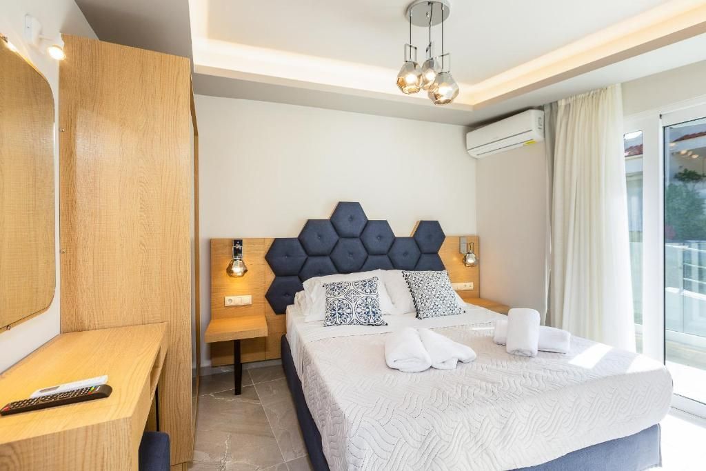 Luxury Suite with Sea View in Akrogiali Luxury Aparthotel фото 2