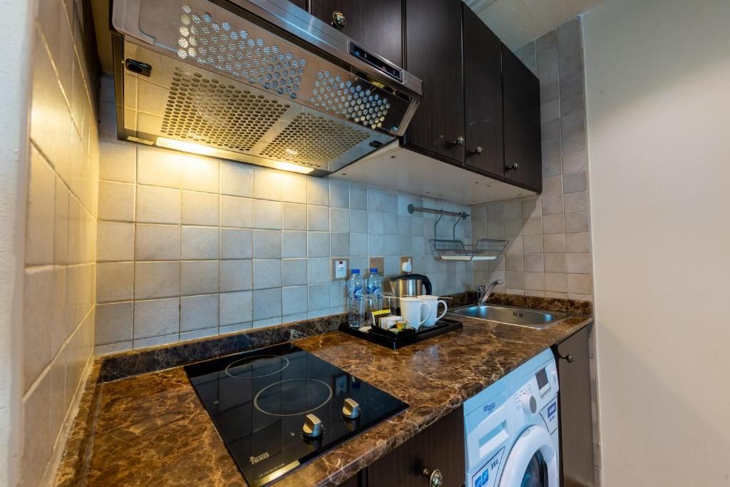 First Central Hotel Suites фото 45